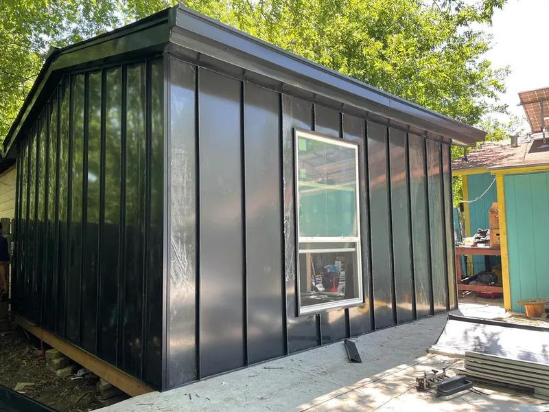 Black standing seam metal wall panels for Roof Inspection in Raleigh