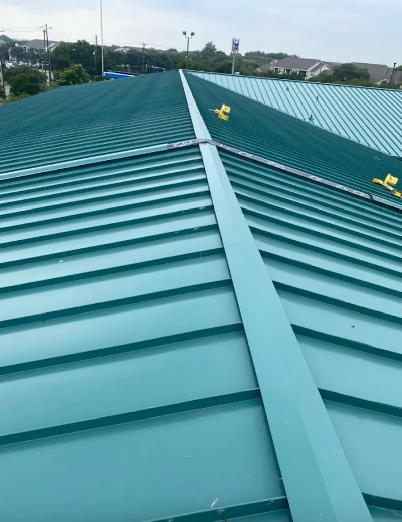 Green commercial metal roof ridge and valley for Metal Roof Repair in Raleigh